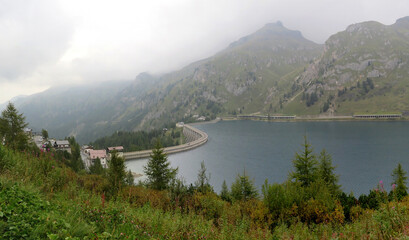 Fototapeta na wymiar Artificial mountain lake in Italian Alps