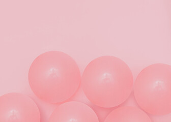 Balloons. Flat lay photo with copy space. Abstract background with pink airballs on pastel pink backdrop