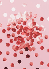 Top view photo with rose gold confetti. Glowing round sparkles on pastel pink background