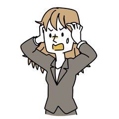 頭を抱えるスーツの女性