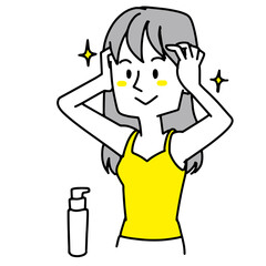 髪の毛をお手入れしている女性