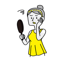 日焼けした顔にびっくりしている女性