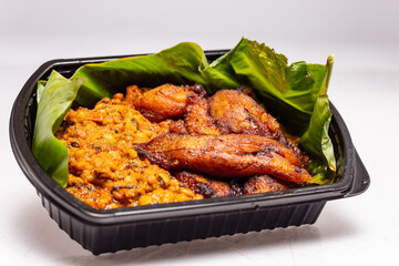 Gob3 or Gari and beans is a type of dish made of staple foods in Ghana. It is usually common in the southern parts of Ghana popularly called bober, borbor or gobe, yo ke gari and even red red. - obrazy, fototapety, plakaty