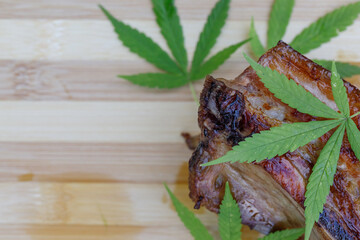 cannabis food with bbq pork ribs grilled with herbs spices served