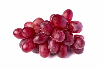 Sweet red grapes bunch of pink isolated on white background