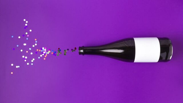 stopmotion of a bottle of champagne opening, confetti flies out, party concept, vertical format