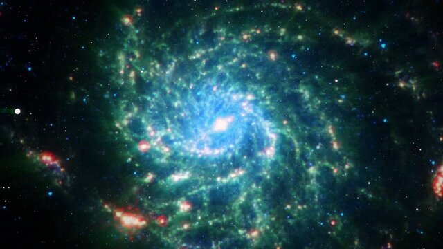 Seamless loop galaxy exploration through outer space towards glowing milky way galaxy. 4K looping animation of flying through glowing Messier 101 Elements furnished by NASA image. 
