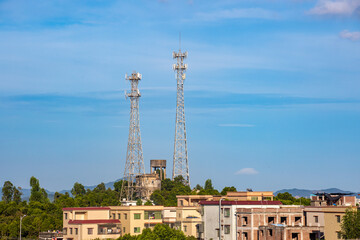 Communication signal tower next to rural China