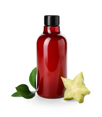 Bottle of shower gel and slice of starfruit on white background