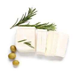 Cut feta cheese, rosemary and olives on white background