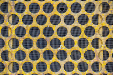 round hole perforated steel yellow and rusty