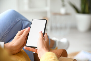 Female hands with modern mobile phone