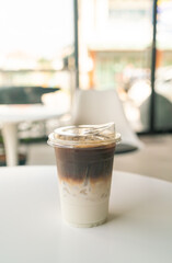 iced latte coffee cup on table