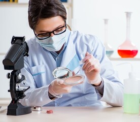 Fototapeta premium Lab chemist checking beauty and make-up products