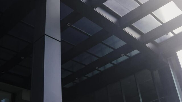 4K video of the ceiling of the entrance of a modern and sophisticate office building in Panama´s city. Concepts of working buildings and architecture.