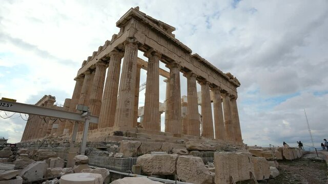Classical monument landmark of Greece, Acropolis. Ruins of ancient Athens pillars in capital Greek city. Traveling, tourism to shrines and temples. Historical building popular with tourists, travelers