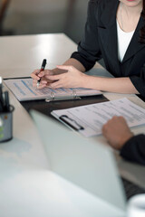 Business people discussing business plan at work.