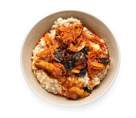 Delicious oatmeal, gravy with beef and prunes in bowl on white background