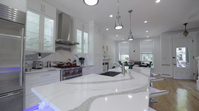 Luxury white designer kitchen, elegant marble countertop with grey markings, interior home