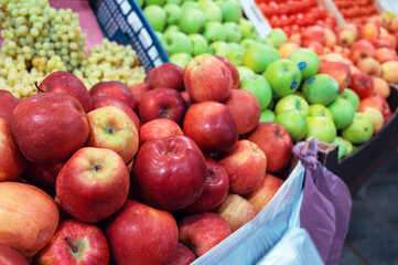 Naklejka na ściany i meble Assortment of fresh fruits at market