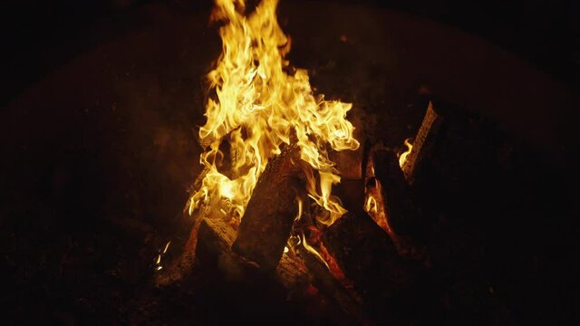 Hot Summer Night Camping with Slow Motion Fire and Logs Burning Outdoors 4k