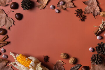 Autumn fall thanksgiving day composition with decorative dried leaves