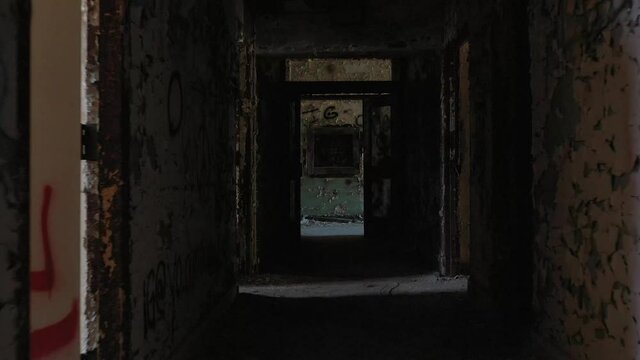 walk down a horrifying hallway of an abandoned sanitorium