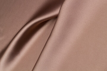 Fototapeta premium Texture of the fabric swirling in a whirlpool. cloth background. Web article template. Long header banner format. Sale coupon. Visit card. Your information. Text space.