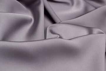 Obraz premium Texture of the fabric swirling in a whirlpool. cloth background. Web article template. Long header banner format. Sale coupon. Visit card. Your information. Text space.