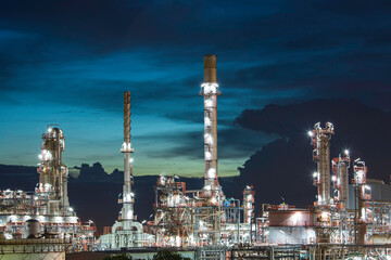 Oil​ refinery ​ and​ plant tower column refinery of petrochemistry industry in oil​ and​ gas​ ​industry with​ cloud​ blue​ ​sky cloud the twilight.