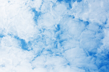 Obraz premium Blue sky scenery with white fluffy clouds for the background.