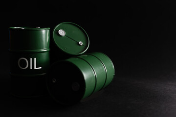 oil barrels on black background