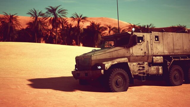 Armoured military truck in desert