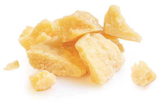 Parmesan cheese (Parmigiano, Grana)  isolated on white background.  Hard mature cheese, macro, studio shot