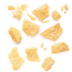 Pieces of parmesan cheese isolated on white background. Pattern. Parmesan  top view. Flat lay. - obrazy, fototapety, plakaty