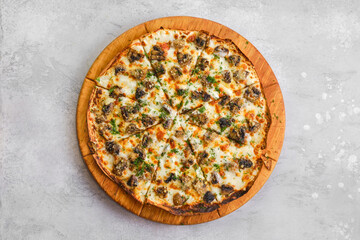 Thin-crust pizza dough with champignon and lot of melted cheese