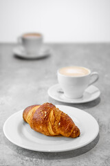 Cappuccino and croissant