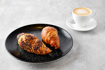 Cappuccino and two croissants