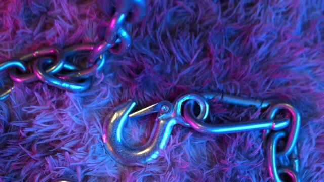 steel chain with hook in neon light