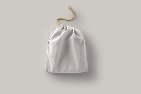 Cotton bag with drawstring Mock up isolated on grey background. Zero waste concept. 3d rendering.
