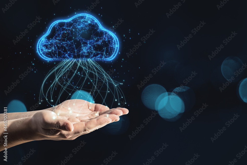 Poster Close up of hand holding glowing blue digital cloud with binary code on dark blurry bokeh background with mock up place. Computing and coding concept.