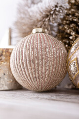 Golden christmas balls with bokeh background.