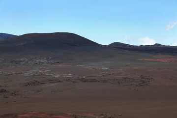 Fototapeta na wymiar View to the Plaine des Sables in Reunion sland in the Indian ocean. This famous desert is situated in the active volcano Piton de la Fournaise