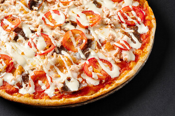 tasty pizza on the black background