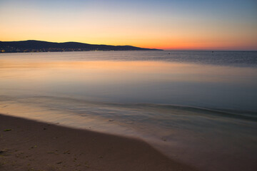 red dawn over a calm sea off the Balkans