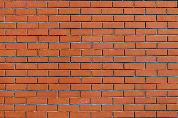 The texture of a brick wall. red brick background.