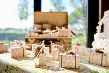 
Beautiful wedding favors on a table in a decorated venue