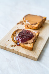 Peanut Butter and Jelly Sandwich with Toast Bread and Raspberry Jam Marmalade.