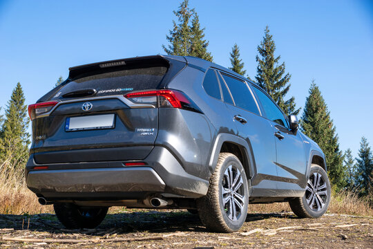 Toyota RAV 4 HYBRID on mountain wilderness	