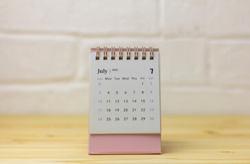 Turn over the calendar for July 2022. Desktop calendar for planning, organizing and managing each date.